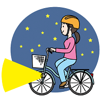 夜間に自転車のライトを点灯し、走行する女性