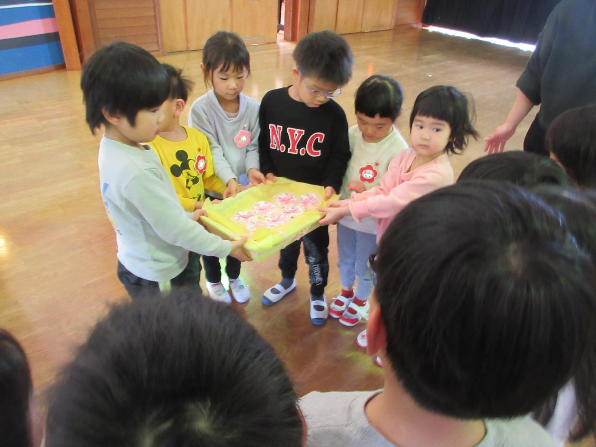 コサージュ渡し